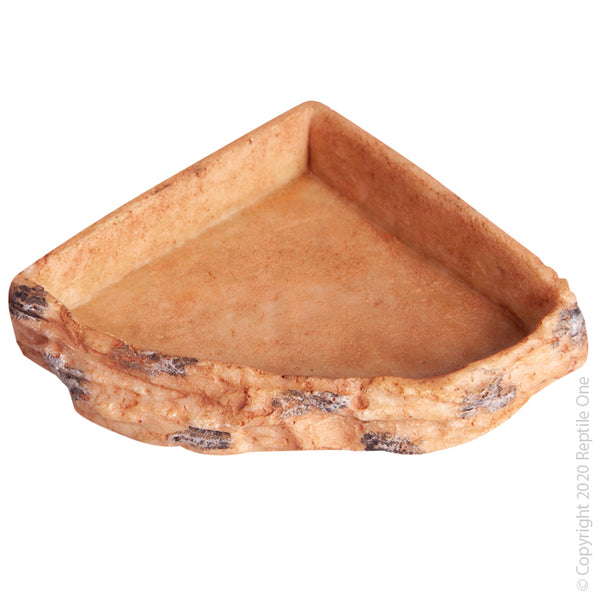 Reptile Corner Bowl M (9.5 X 9.5 X 2.3 cm). The Reptile One Corner Bowls are durable feeding bowls that blend into your reptile’s environment.  The corner bowls are available in various sizes in a corner fit style and will make a natural looking addition to any terrarium!