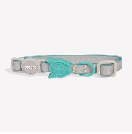 Zee Cat NeoPro Cat Collar - Tidal  The NeoPro™ cat collar by Zee.Dog is built with a NeoPro™ rubber overlay that protects the Polyester making it extremely weather proof, scratch resistant and super easy to clean. The buckle is a break away buckle that will keep your cat safe when outside. The signature rubber logo protects stitching for durability.