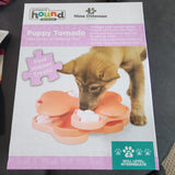 Nina Ottosson Puppy Tornado, 4 layers of spinning fun  12 hidden treat compartments  Puppies spin layers and remove bones with their paws and nose to uncover treats  Helps reduce destructive behaviour by exercising your puppies mind  Skill level 2   
