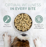 Bowl of freeze dried dog bites above a dog, with New Zealand-made and ingredient information.